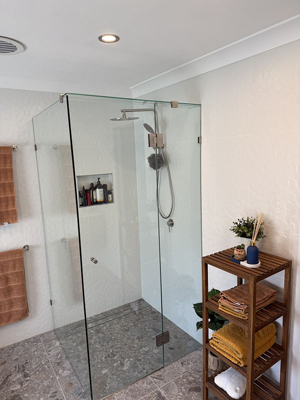 Large frameless glass shower screen